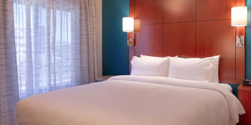 Interior shot of comfy bed a the Residence Inn by Marriott Gilbert