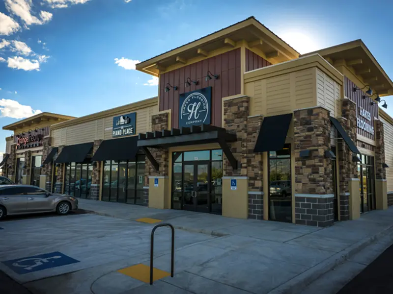 Exterior of multiple fronts of buildings at Center Pointe shopping center