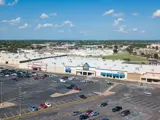 Exterior aerial view of parking lot and multiple buildings apart of Floor & Decor Mesquite