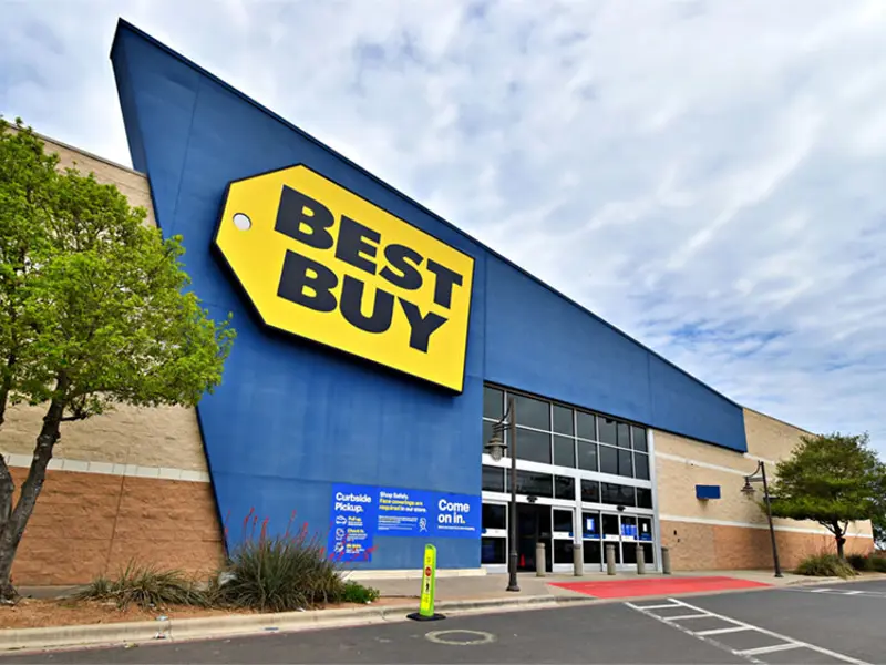 Exterior view of Best Buy building and parking area apart of Central Texas Marketplace