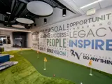 Interior of Ball Ventures Knolls Suite 300 of golf putting green
