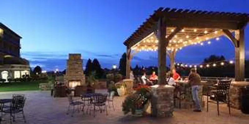 Exterior lounge area with gazebo at Hilton Garden Inn Idaho Falls at night