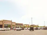 Exterior of Ball Ventures real estate shopping area and parking lot