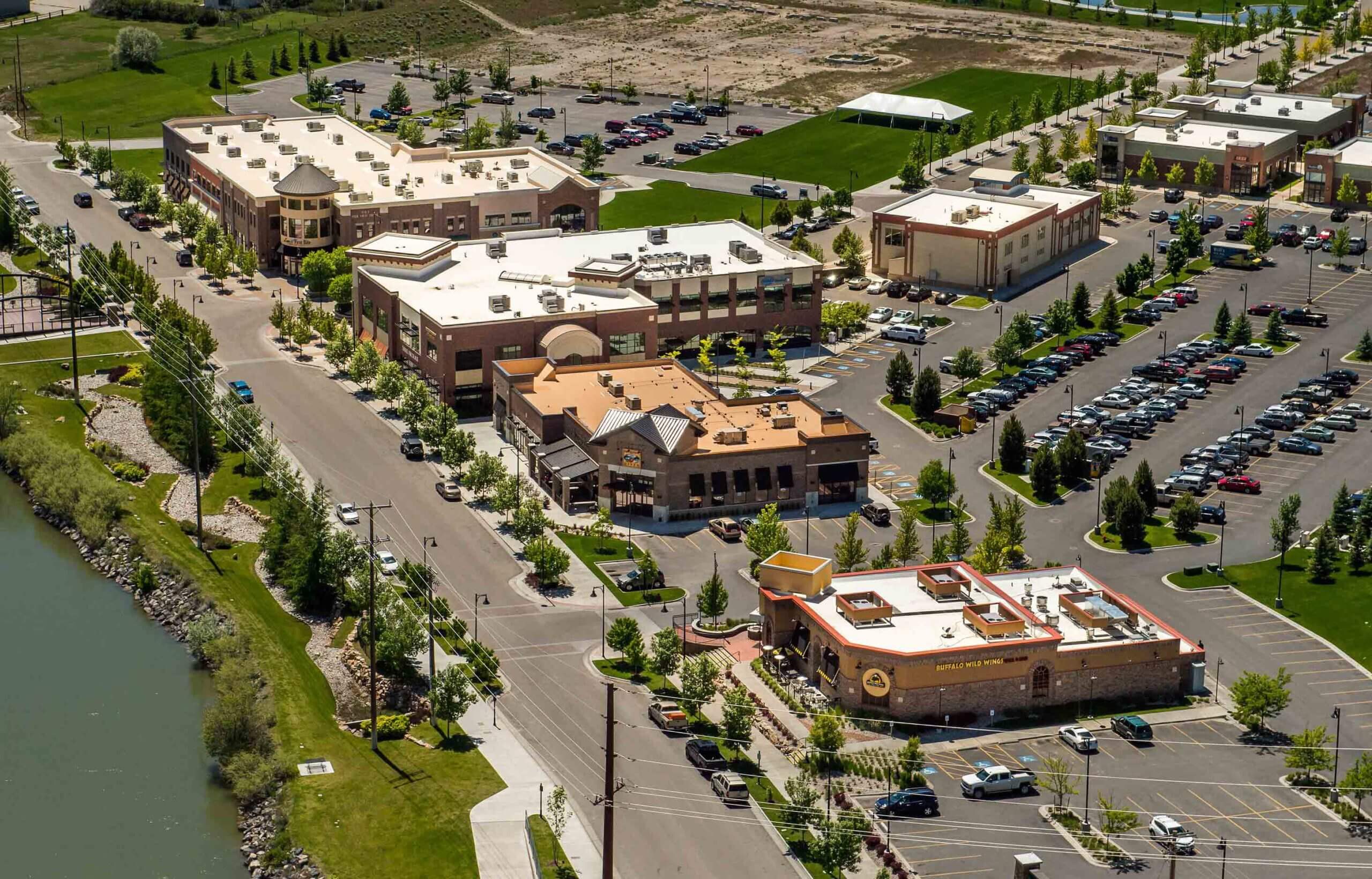 Aerial overhead view of Snake River Landing and buildings on sunny day
