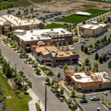 Aerial overhead view of Snake River Landing and buildings on sunny day