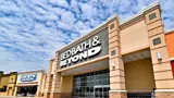 Exterior front of Bed, Bath & Beyond building during the day