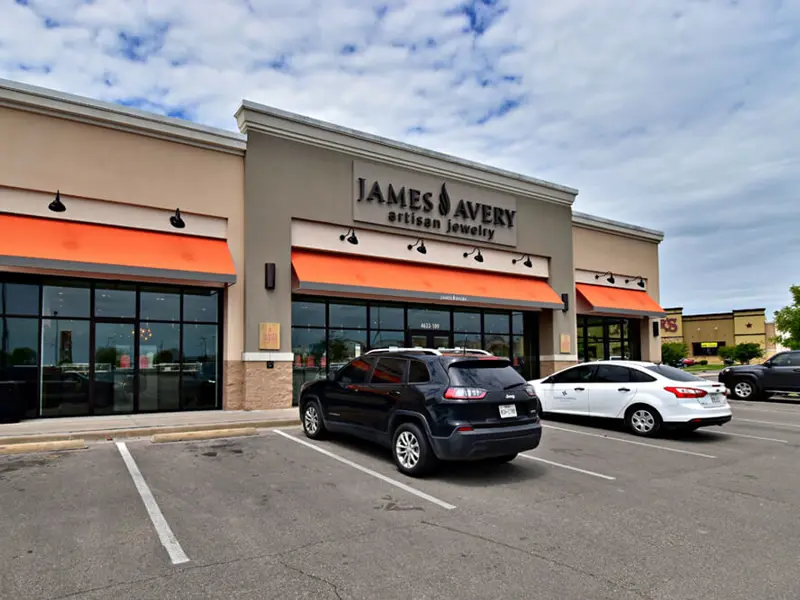 Exterior view of James Avery building and parking area apart of Central Texas Marketplace
