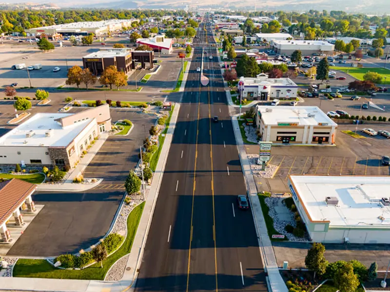 Exterior aerial view of buildings and roads apart of Alameda Plaza
