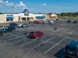 Exterior of parking lot and multiple buildings apart of Floor & Decor Mesquite