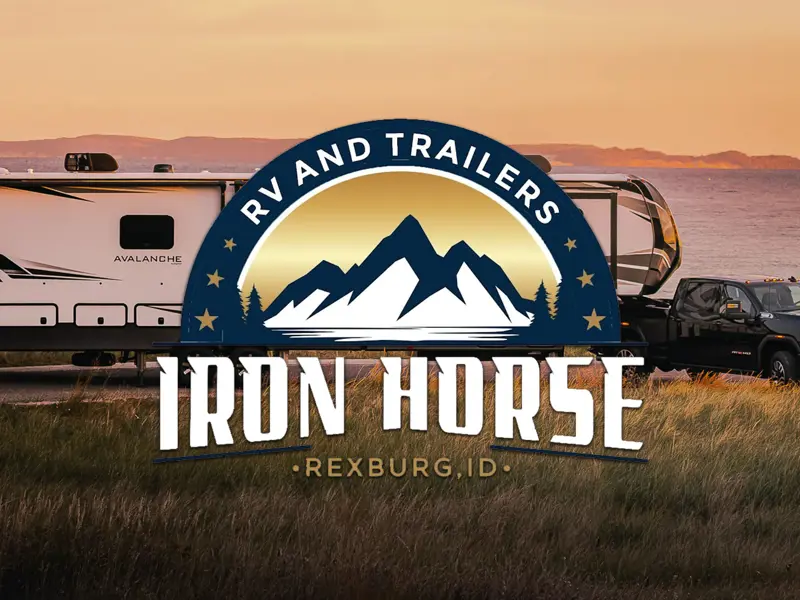 Iron Horse RV and Trailer logo on top of sunset picture of RV and truck