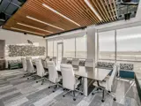Interior of long table and chairs within The Knolls Suite 300 Ball Ventures conference room