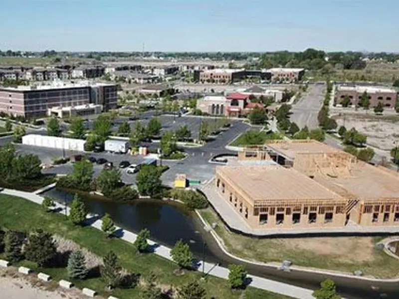 Aerial sideview of real estate and development in Idaho Falls overlooking Snake River Landing