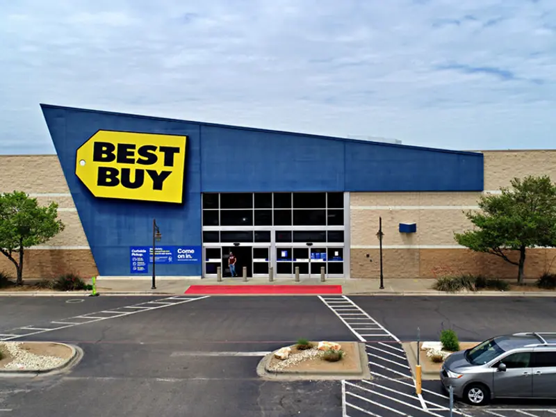 Exterior view of Best Buy building and parking area apart of Central Texas Marketplace