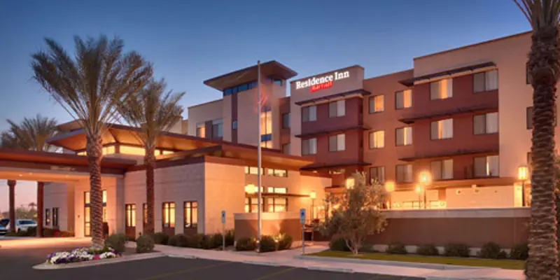 Exterior of front Residence Inn by Marriott Gilbert hotel at night